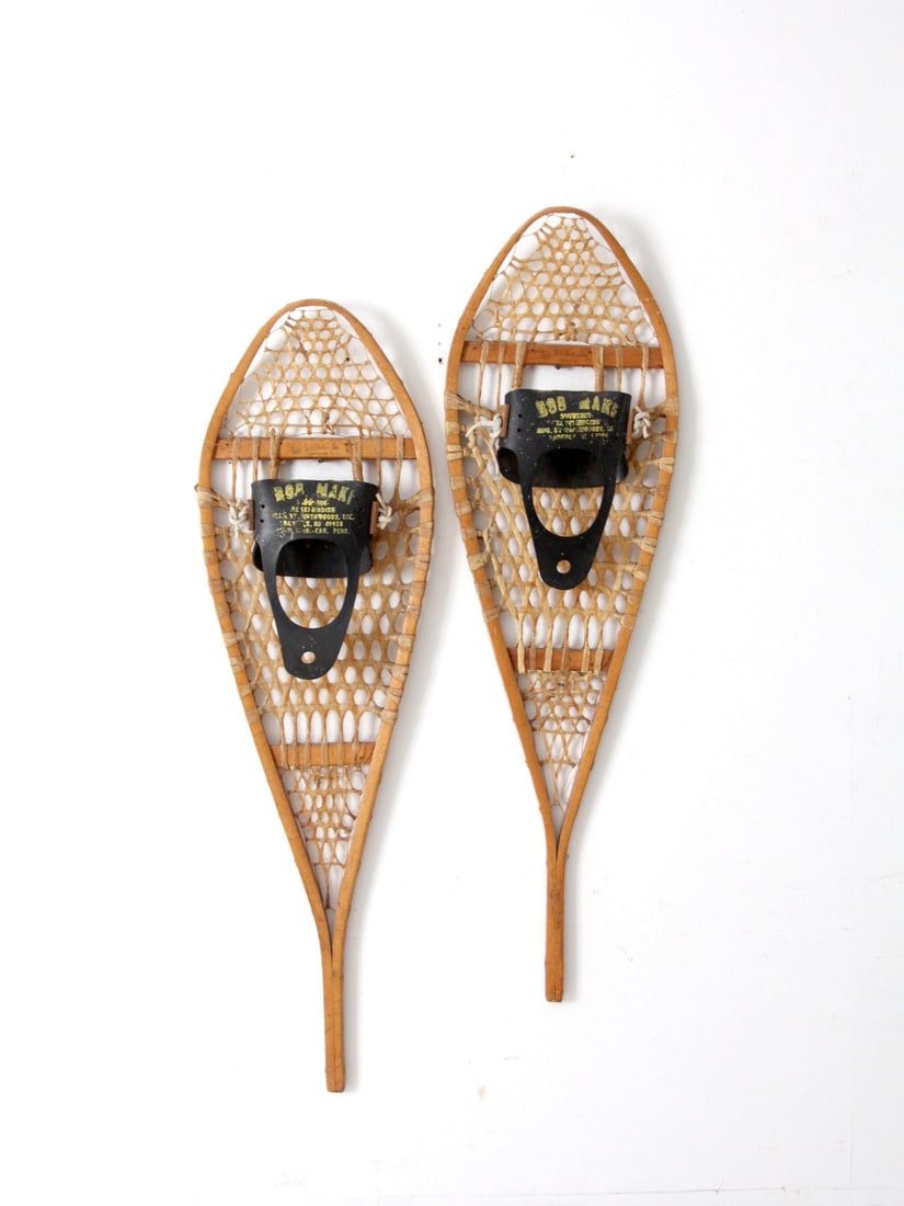 Pair of 1950s Gander Mountain Rawhide Canadian Snowshoes: Pair of 1950s Gander Mountain Rawhide Canadian Snowshoes This vintage pair of Canadian snowshoes features bent wood frames, traditional rawhide webbing, and DB Maki rubber bindings. Marked Gander Moun