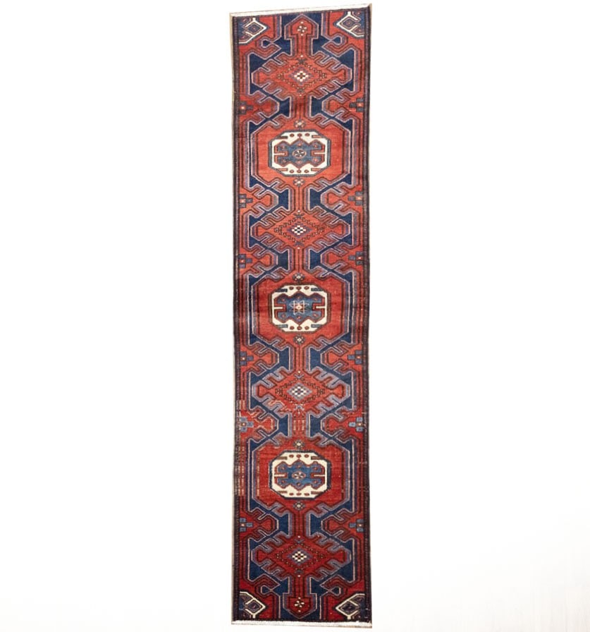 Vintage Wool Hand Knotted Geometric Runner Rug 1'11 x 9'2: Vintage Wool Hand Knotted Geometric Runner Rug 1'11 x 9'2 This vintage hand-knotted runner rug features a striking tribal geometric design in a rich palette of red, purple-navy, cream, blue, and brown