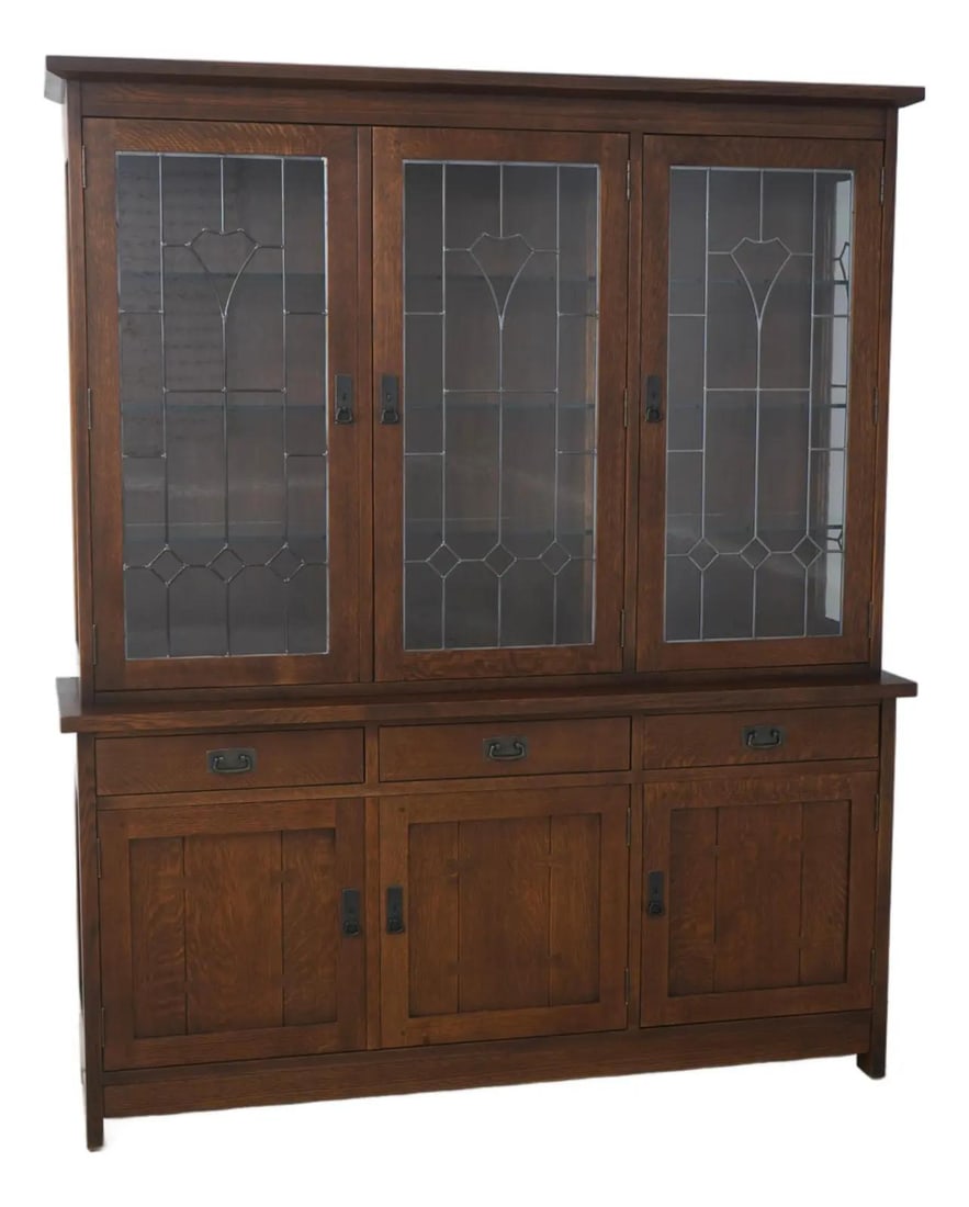 Stickley Arts and Crafts Oak China Cabinet with Leaded Glass: Stickley Arts and Crafts Oak China Cabinet with Leaded Glass A large Stickley Mission oak china cabinet in an Arts & Crafts style, described as approximately 30 years old. It features a lighted interi