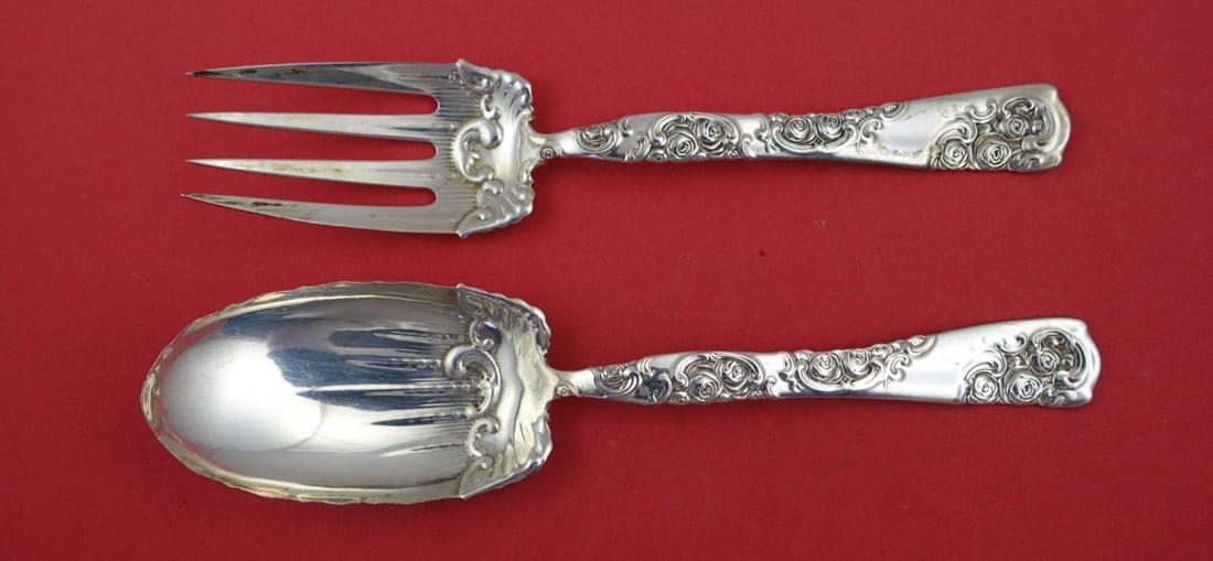 Whiting Rose and Scroll Sterling Silver Salad Serving Set 9": Whiting Rose and Scroll Sterling Silver Salad Serving Set 9" This exquisite Rose and Scroll Salad Serving Set by Whiting is crafted from sterling silver, embodying timeless elegance. Produced between 