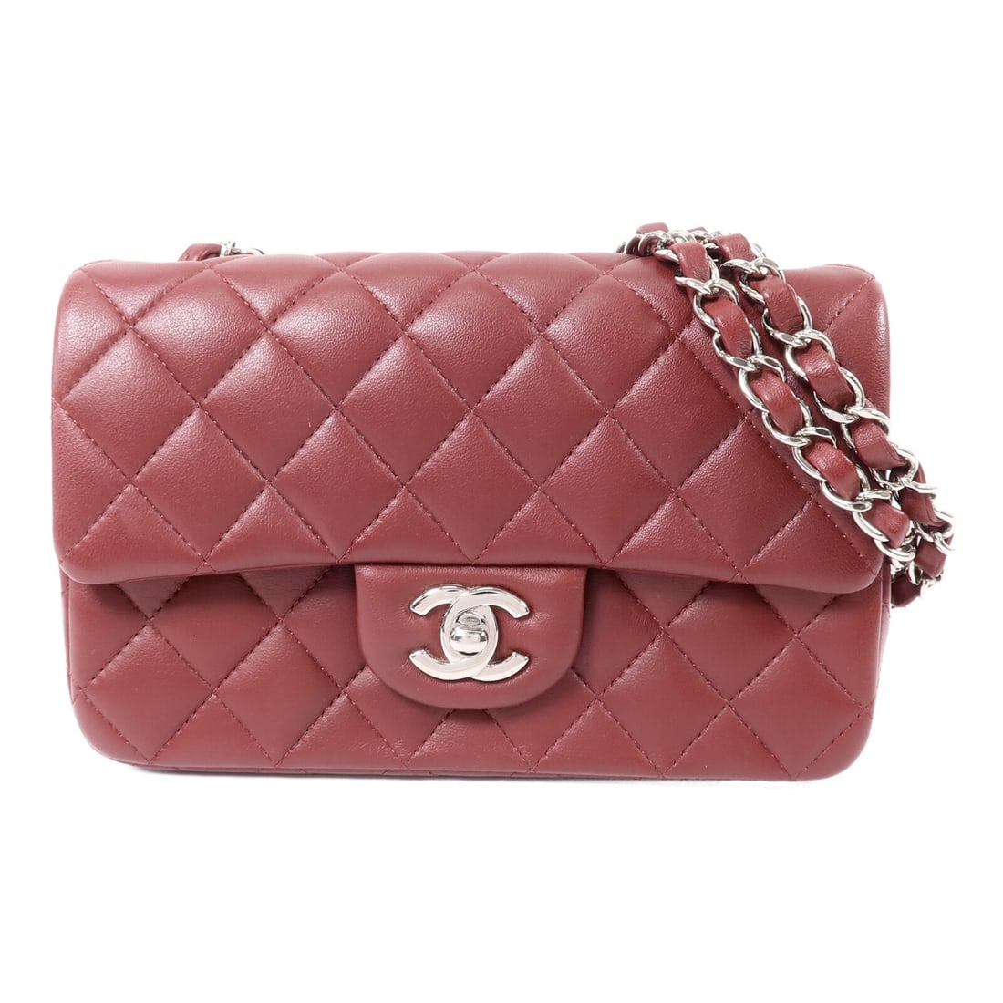 CHANEL Mini Classic 20 Red Lambskin Shoulder Bag: CHANEL Mini Classic 20 Red Lambskin Shoulder Bag This CHANEL Mini Classic 20 shoulder bag is crafted from luxurious lambskin leather in a striking red color. Designed for women, it features a compact 
