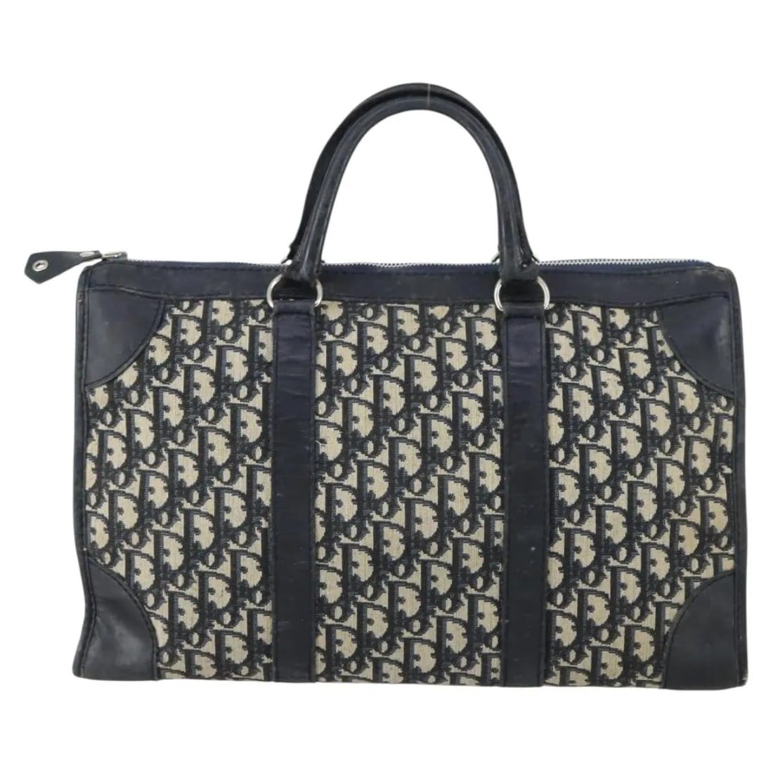 Navy Canvas Boston Bag by Christian Dior Vintage Trotter 40cm: Navy Canvas Boston Bag by Christian Dior Vintage Trotter 40cm This vintage Christian Dior Trotter Boston bag features a navy canvas exterior with leather and metal fittings. Designed for women, it mea