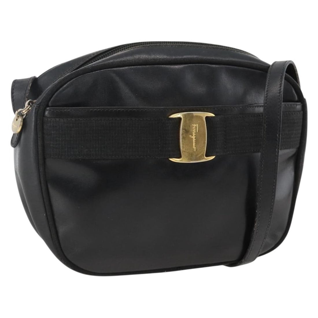 Salvatore Ferragamo Vala Black Leather Shoulder Purse with Gold Accents: Salvatore Ferragamo Vala Black Leather Shoulder Purse with Gold Accents This Salvatore Ferragamo Vala shoulder bag features black leather with gold-tone accents. Designed for women, it is made in Ital