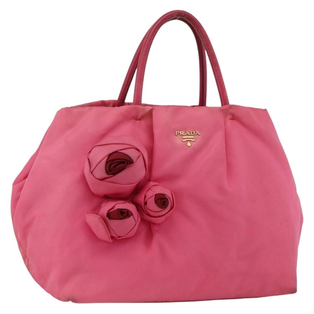 Prada Pink Nylon Women's Handbag with Gold Tone Accents: Prada Pink Nylon Women's Handbag with Gold Tone Accents This PRADA women's handbag features a pink and gold nylon exterior, offering a stylish and functional design. Made in Italy, the bag includes a 