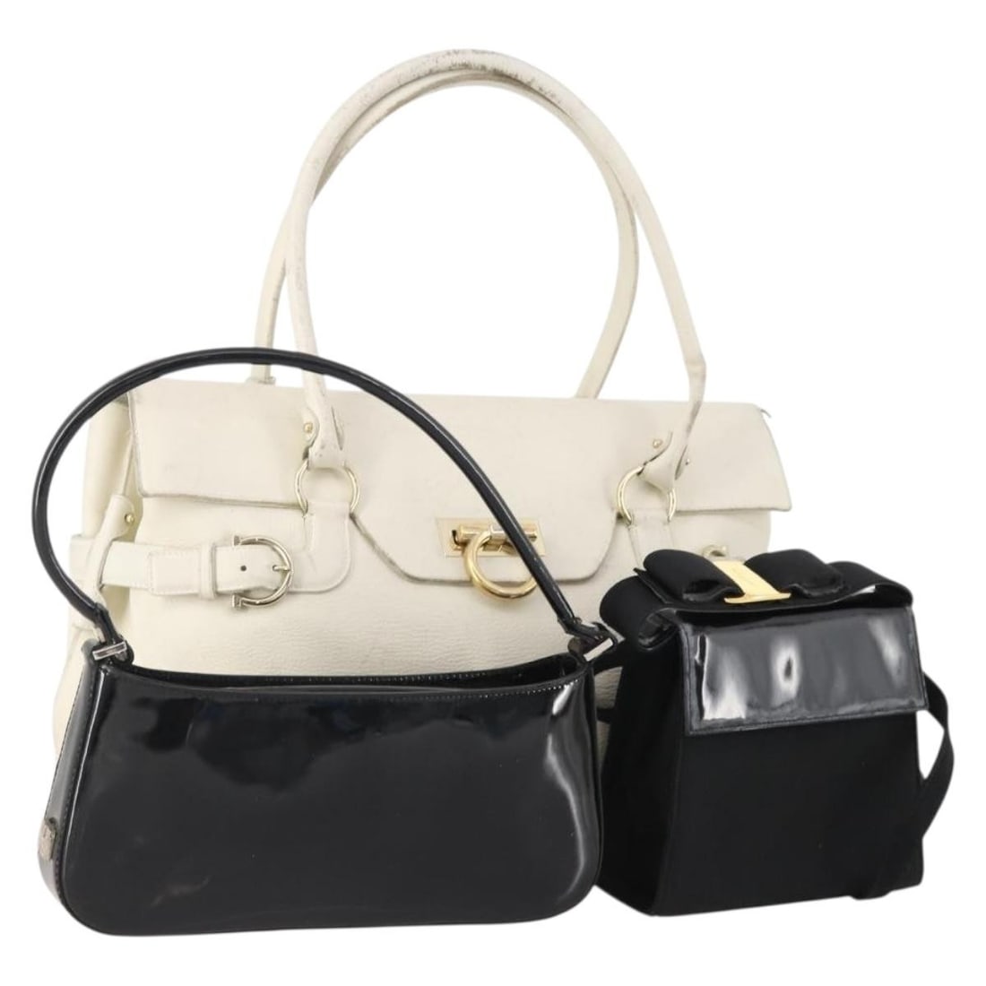 Salvatore Ferragamo Patent Leather Handbag Set White Black Navy: Salvatore Ferragamo Patent Leather Handbag Set White Black Navy This is a Salvatore Ferragamo handbag set featuring three patent leather bags in white, black, and navy. Designed for women, each bag is