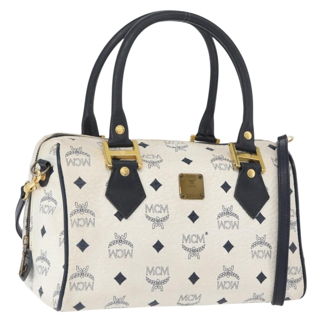 MCM Vicetos Boston Bag White Gold PVC Leather Shoulder Satchel Germany: MCM Vicetos Boston Bag White Gold PVC Leather Shoulder Satchel Germany This MCM Vicetos Logogram Boston Bag features a two-way design crafted from white and gold PVC leather. Designed for women, it of