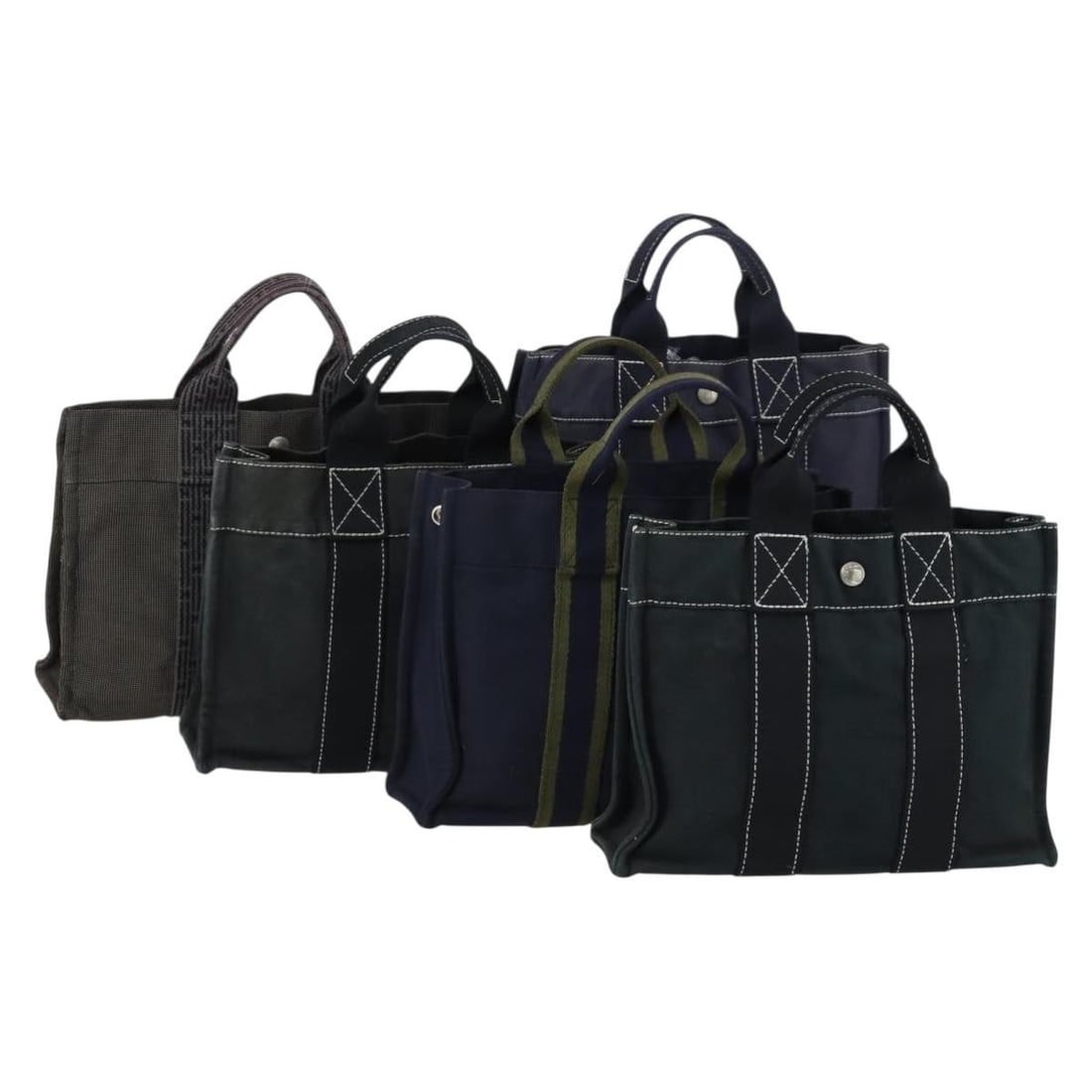 Set of 5 Canvas Her Line Fourre Tout Bags in Black Navy Gray by Hermes: Set of 5 Canvas Her Line Fourre Tout Bags in Black Navy Gray by Hermes This is a Hermes Her Line Fourre Tout hand bag set, consisting of five canvas bags in black, navy, and gray. The bags were made i