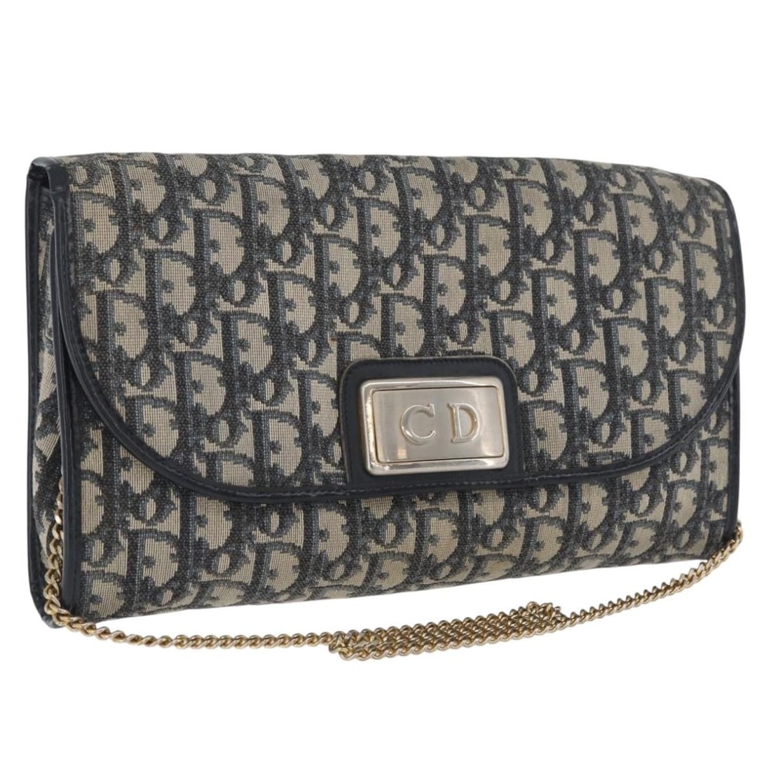 Christian Dior Navy Trotter Canvas Shoulder Purse with Gold Chain France: Christian Dior Navy Trotter Canvas Shoulder Purse with Gold Chain France This Christian Dior Trotter Canvas chain shoulder bag features a navy and gold color combination and is crafted from Trotter ca