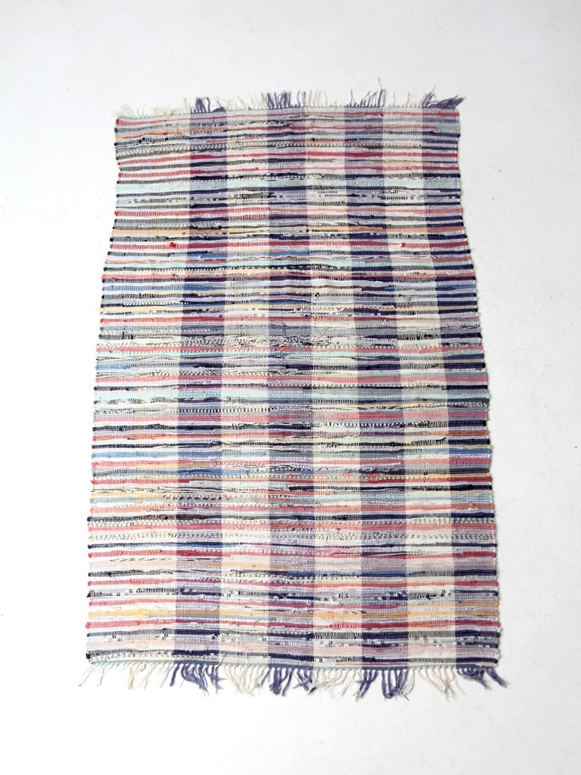 48 x 79 Inch Midcentury American Handwoven Rag Area Rug: 48 x 79 Inch Midcentury American Handwoven Rag Area Rug This mid-20th century American hand-loomed rag rug features a soft striped design in muted blues, faded reds, pale aqua, and warm off-white tone
