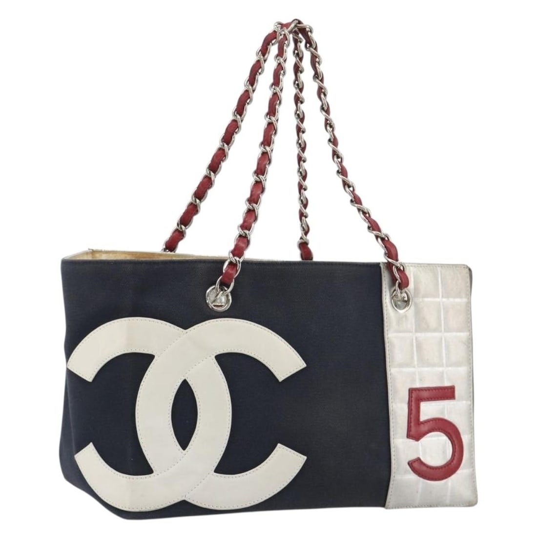 CHANEL Choco Bar Canvas Tote Shoulder Bag Navy Silver: CHANEL Choco Bar Canvas Tote Shoulder Bag Navy Silver Chanel Choco Bar chain shoulder tote bag in navy canvas with silver-tone accents. Made in Italy, this women's tote is offered as the photographed 
