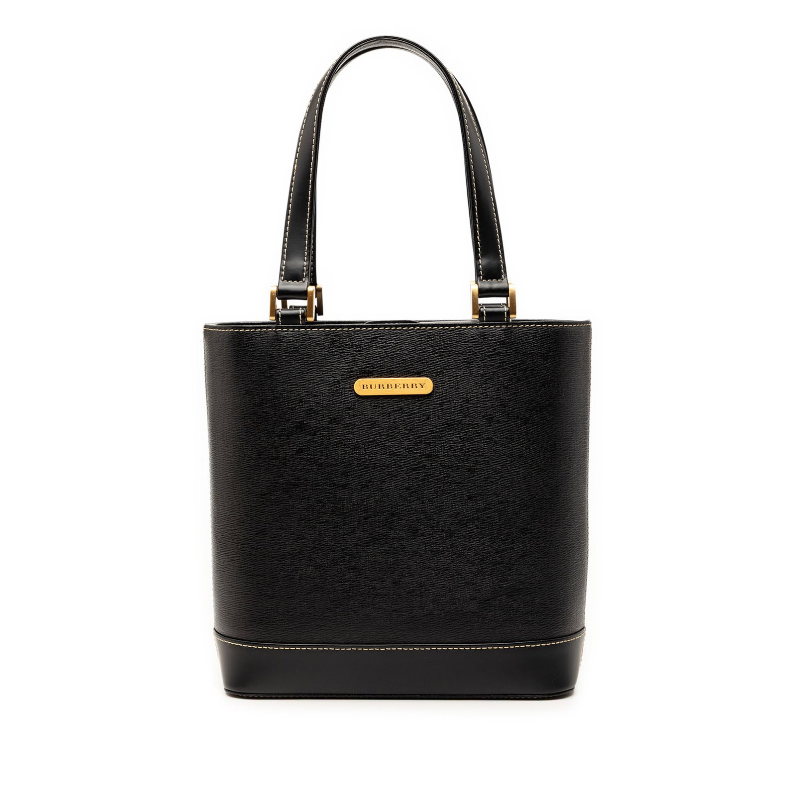 Burberry black leather flap tote handbag: Burberry black leather flap tote handbag This Burberry handbag is crafted from leather and features flat leather handles, an open top with a fold-in flap and magnetic snap closure, and interior zip an