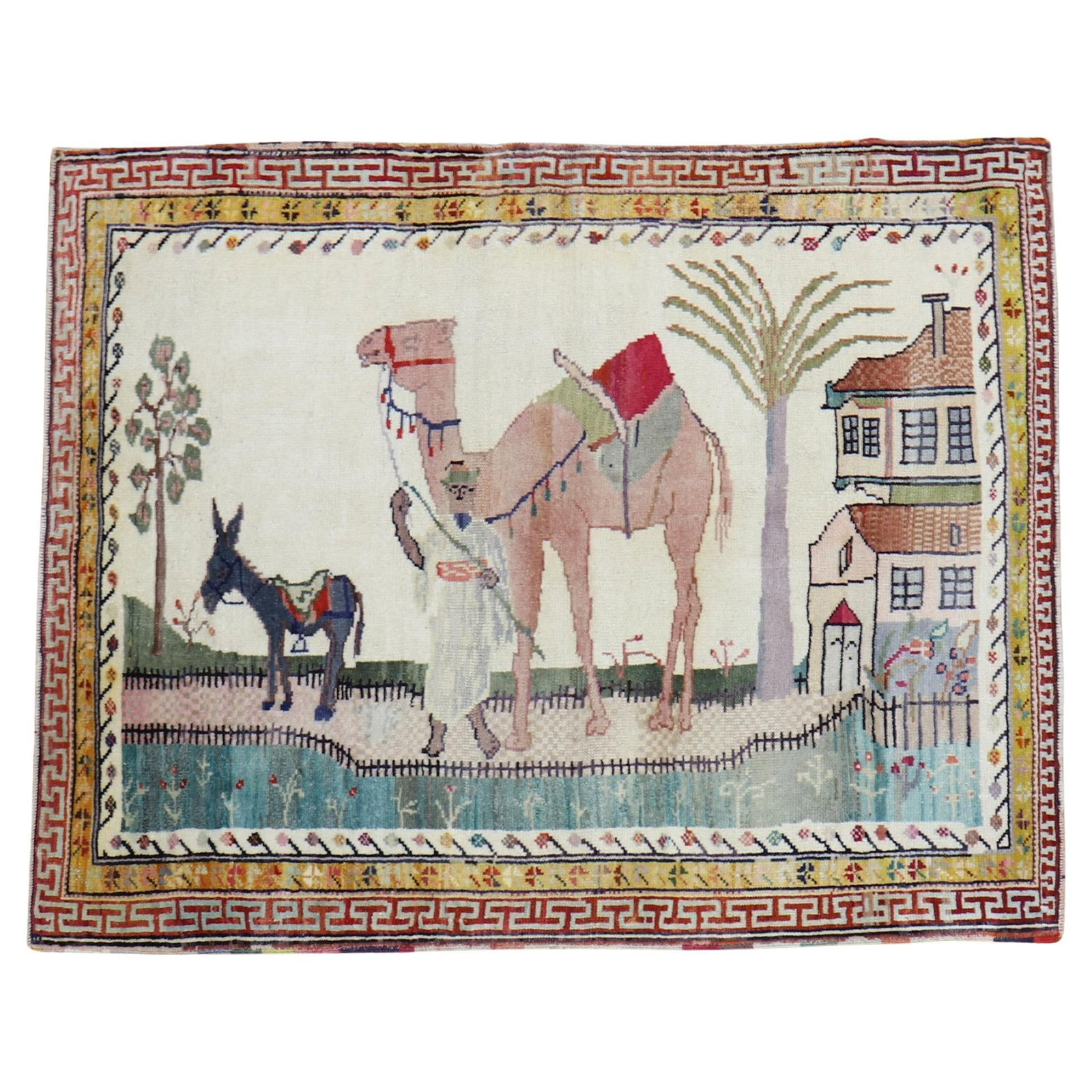 Mid-20th Century Turkish Anatolian Pictorial Rug Camel Donkey Wool: Mid-20th Century Turkish Anatolian Pictorial Rug Camel Donkey Wool This exquisite mid-20th century Turkish Anatolian rug features a charming pictorial design showcasing a donkey and camel. Hand-woven 