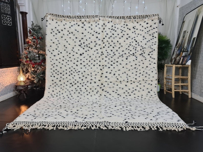 Authentic Handwoven Soft Dotted Rug from Morocco 100% Wool: Authentic Handwoven Soft Dotted Rug from Morocco 100% Wool Discover the Authentic Soft Dotted Rug, handwoven by local Berber women weavers in the Atlas Mountains of Morocco. This exquisite rug is craf