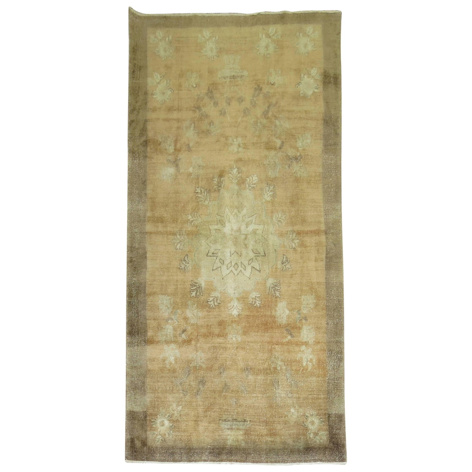 Khotan Wool Hand Knotted Turkish Gallery Rug 60 x 118 in: Khotan Wool Hand Knotted Turkish Gallery Rug 60 x 118 in This vintage Turkish rug, crafted circa 1940, features a gallery size and showcases a palette of browns and camel tones. Hand-knotted from wool