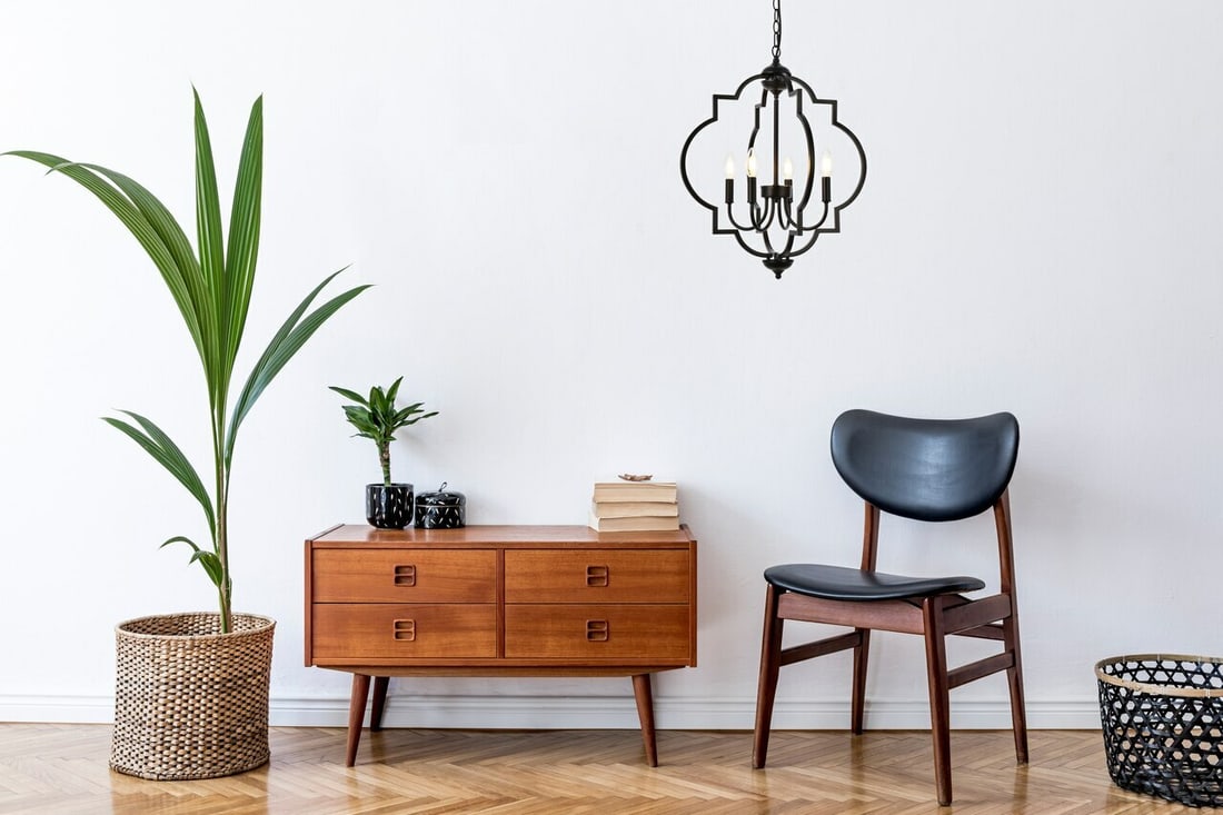 Living District Sandara 4-Light Black Iron Pendant: Living District Sandara 4-Light Black Iron Pendant This mid-century modern pendant chandelier features a sleek black finish and a round shade, offering a stylish lighting solution for kitchens, dining