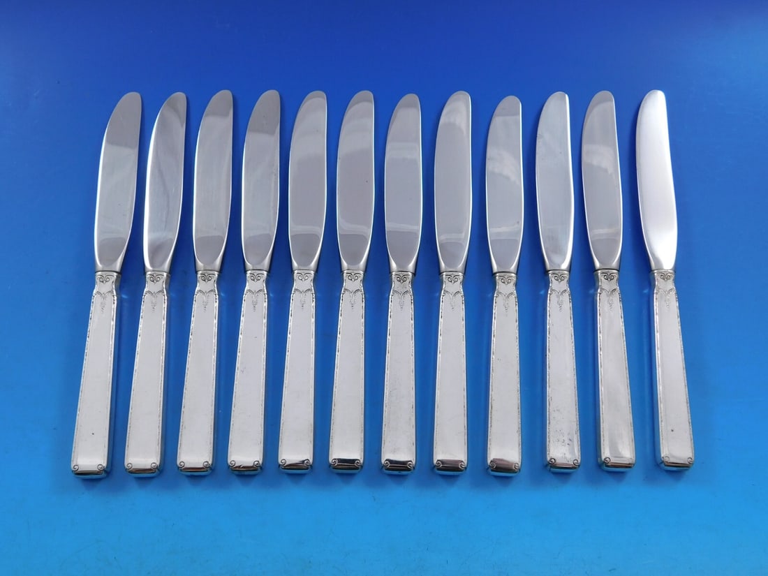 Towle Old Lace Sterling Silver Butter Spreader Set of 12 6 1/4 inch: Towle Old Lace Sterling Silver Butter Spreader Set of 12 6 1/4 inch Enhance your dining experience with this exquisite set of 12 butter spreaders from the Old Lace pattern by Towle. Crafted from high-