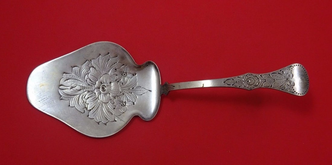 Th. Olsens Floral Design .830 Silver Pie Server 9 1/8 Inch: Th. Olsens Floral Design .830 Silver Pie Server 9 1/8 Inch This exquisite pie server from Th. Olsens features a beautiful floral design and is crafted from .830 silver, a mark of high quality. Measuri
