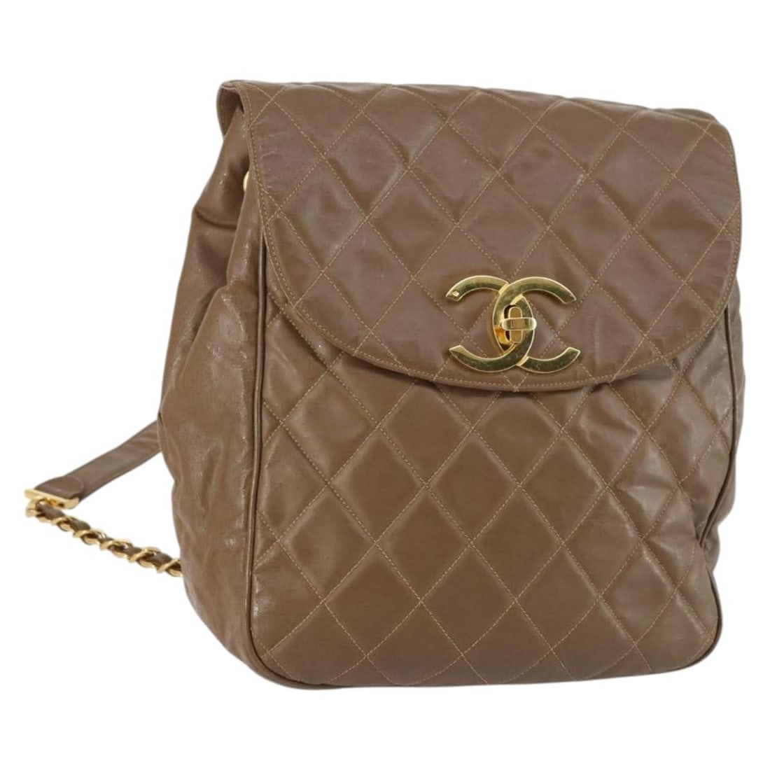 CHANEL CC Matelasse Coated Canvas Backpack Brown Gold: CHANEL CC Matelasse Coated Canvas Backpack Brown Gold Chanel Matelasse backpack in brown and gold coated canvas. This women's backpack is made in Italy and is offered without the original box or dust 