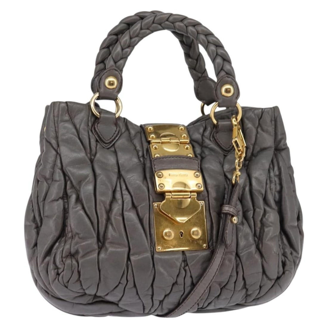 Miu Miu Matelasse Leather 2way Handbag Gray with Strap: Miu Miu Matelasse Leather 2way Handbag Gray with Strap Gray Miu Miu matelasse 2-way handbag in leather with gold-tone accents. This women's bag includes a shoulder strap, key, and clochette. It has be