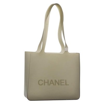 Rubber Tote Bag CHANEL Gray Silver CC: Rubber Tote Bag CHANEL Gray Silver CC Gray CHANEL tote bag in rubber with silver-tone CC detailing. This heavily used bag shows visible wear throughout, including loss of shape, rubbing, stains, scrat