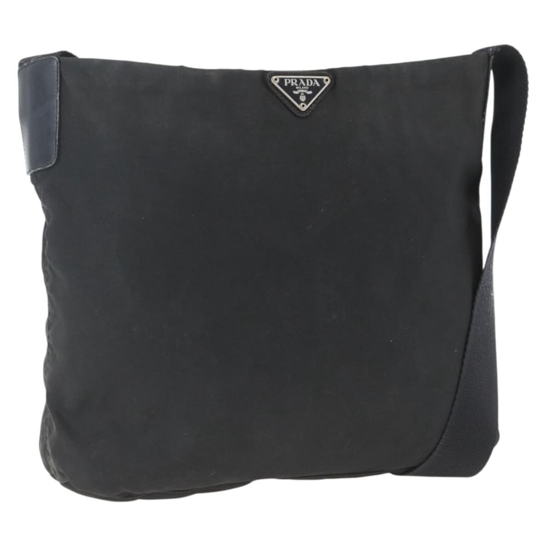 Black Nylon PRADA Shoulder Bag with Silver Tone Hardware: Black Nylon PRADA Shoulder Bag with Silver Tone Hardware This PRADA shoulder bag features a black nylon exterior with silver-tone accents. The bag is designed with an adjustable shoulder strap and off