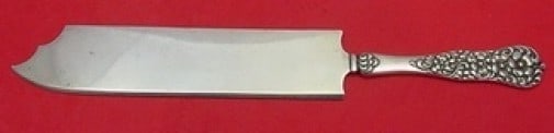 Rococo Sterling Silver Ice Cream Slice by Dominick & Haff 12 1/8 inches: Rococo Sterling Silver Ice Cream Slice by Dominick & Haff 12 1/8 inches Indulge in serving desserts with this exquisite ice cream slice from the Rococo pattern by Dominick & Haff. Crafted from high-qu