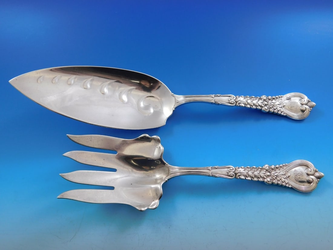 Tiffany & Co. Florentine Sterling Silver Fish Serving Set 2-Piece: Tiffany & Co. Florentine Sterling Silver Fish Serving Set 2-Piece Elevate your dining experience with this exquisite Florentine Fish Serving Set by Tiffany & Co. Crafted from high-quality sterling sil