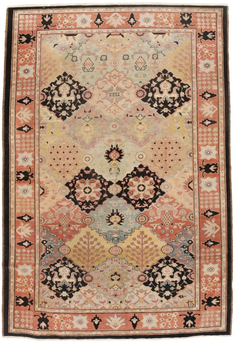 Hand-Knotted Pakistani Wool Area Rug 5'7 x 8'1 Tribal Floral Pattern: Hand-Knotted Pakistani Wool Area Rug 5'7 x 8'1 Tribal Floral Pattern This hand-knotted Ziegler tribal floral rug features a distressed look with modern and boho influences. Crafted from wool, it showc
