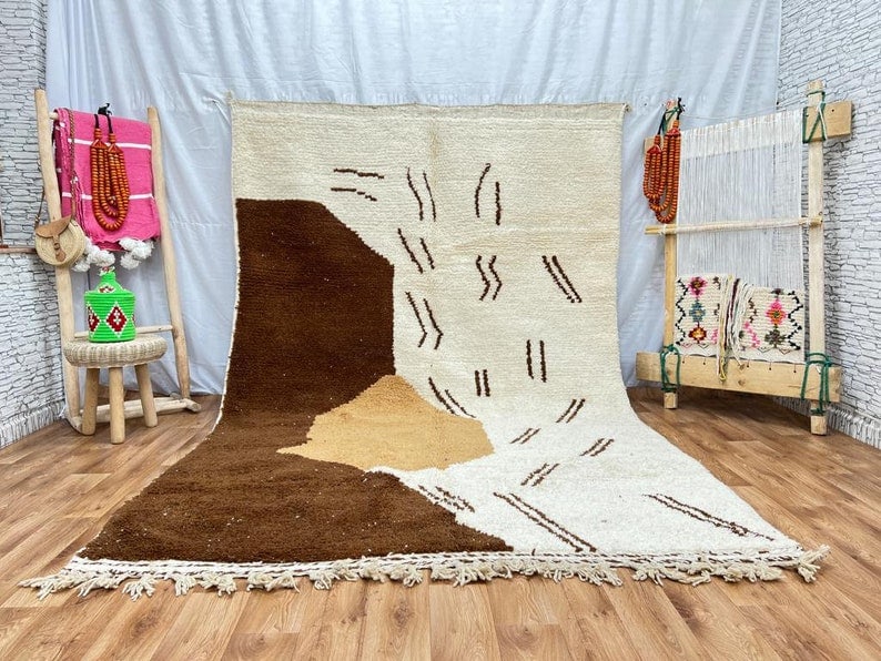 Authentic Handwoven Moroccan Soft Rug 100% Sheep Wool 8 x 5 Feet: Authentic Handwoven Moroccan Soft Rug 100% Sheep Wool 8 x 5 Feet Discover the allure of this authentic soft rug, handwoven in the picturesque Atlas Mountains by skilled local Berber women weavers. Cra