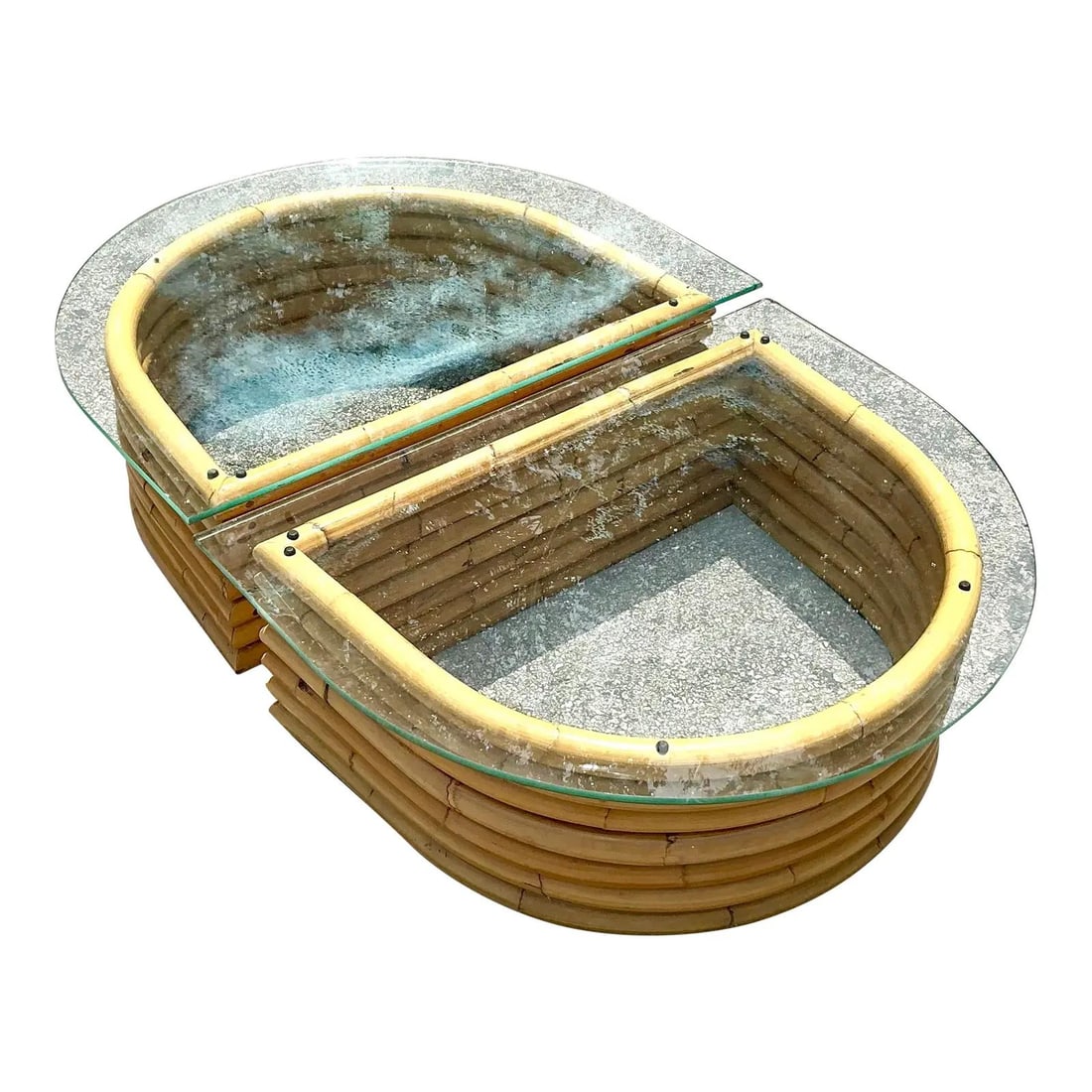 Vintage Boho Rattan Coffee Table Set of 2 with Glass Tops: Vintage Boho Rattan Coffee Table Set of 2 with Glass Tops This vintage Boho bent rattan coffee table set from the 1970s exemplifies modular design with its organic textures and sculptural forms. Made 