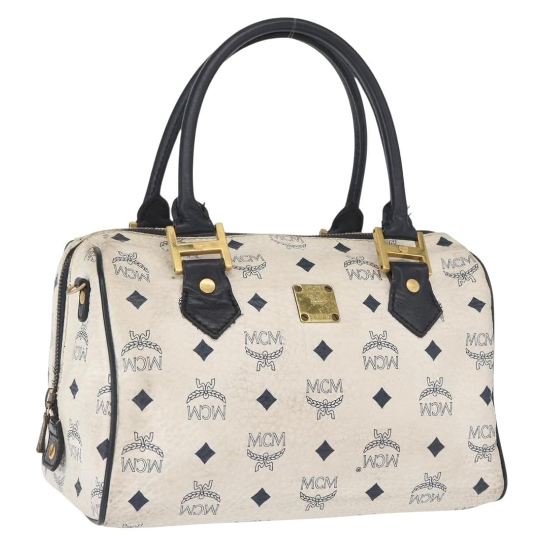 MCM Vicetos White PVC Leather Handbag Gold Accents Germany: MCM Vicetos White PVC Leather Handbag Gold Accents Germany This MCM Logogram Vicetos handbag is crafted from white and gold PVC leather. Designed for women, it features a structured silhouette with a 