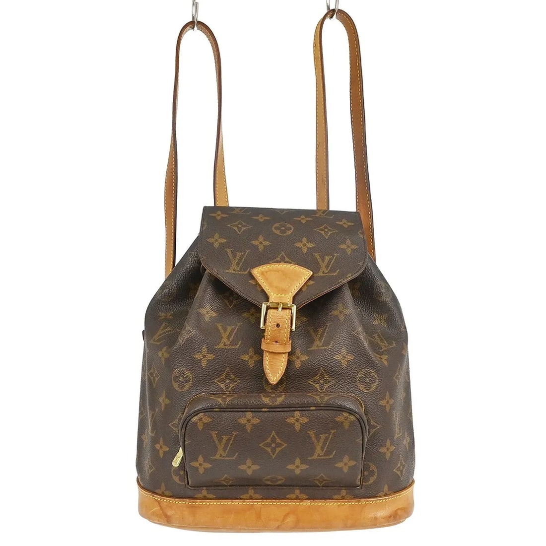 Louis Vuitton Vintage Montsouris Monogram Canvas Backpack: Louis Vuitton Vintage Montsouris Monogram Canvas Backpack Vintage Louis Vuitton Montsouris backpack in brown monogram canvas. This unisex piece is made in France and shows fair overall condition with 