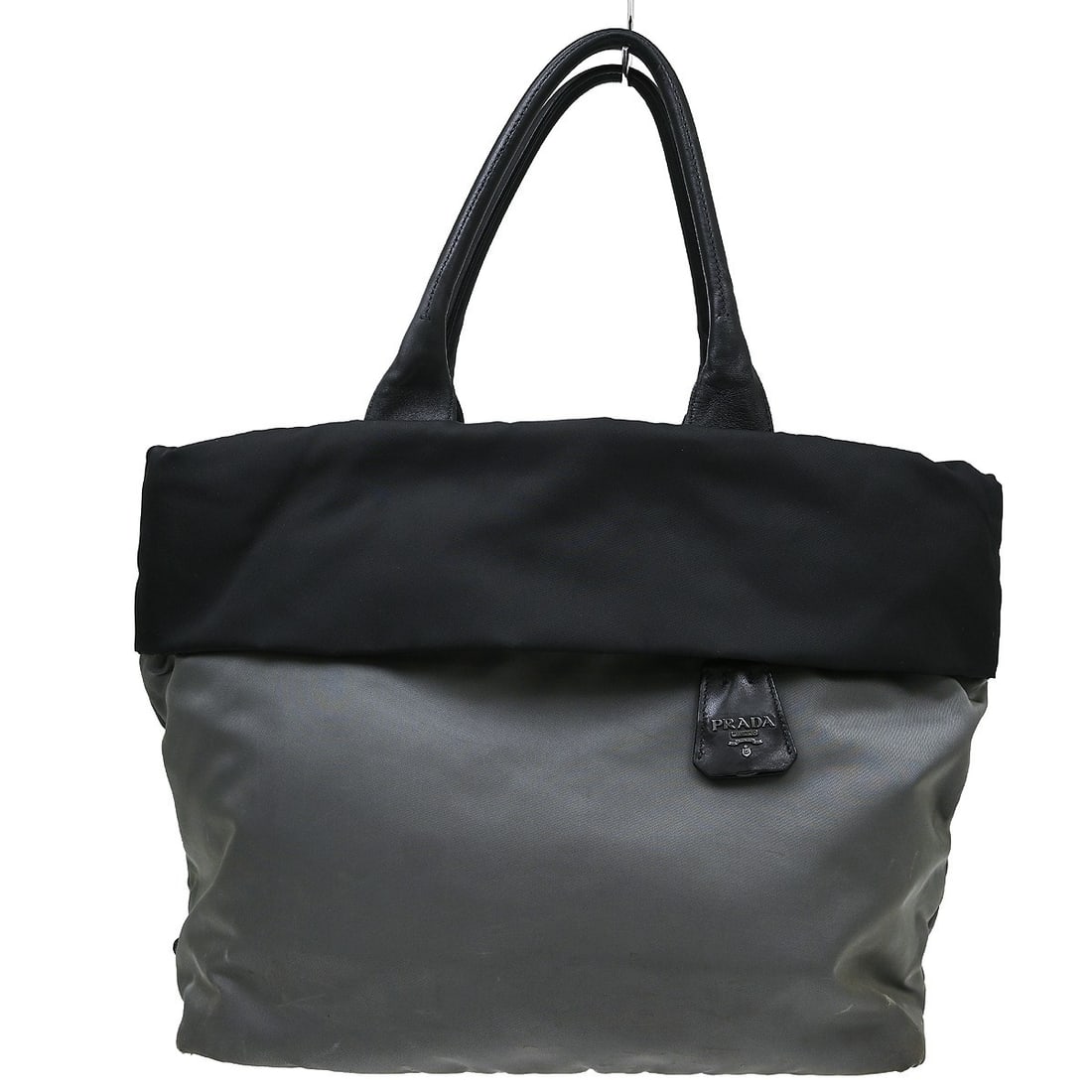 Prada 173 180 G Large Nylon Tote Bag Black Gray: Prada 173 180 G Large Nylon Tote Bag Black Gray Large Prada tote handbag in black and gray nylon with logo accents and a canvas lining. Made in Italy, this casual tote features an interior zipper pock
