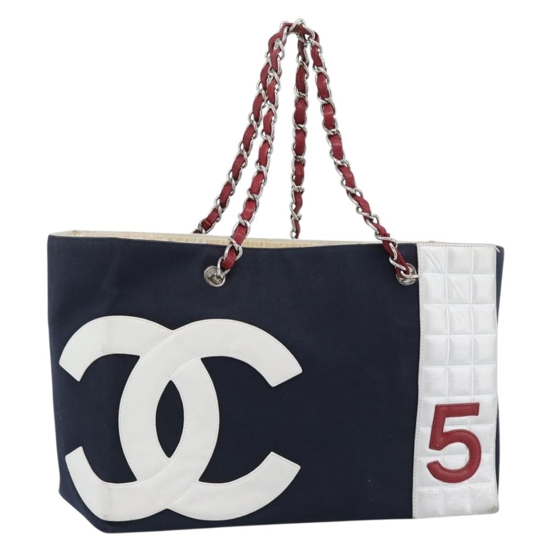 CHANEL Choco Bar Canvas Tote Bag Navy Silver Tone with Guarantee Card: CHANEL Choco Bar Canvas Tote Bag Navy Silver Tone with Guarantee Card Chanel Choco Bar chain tote bag in navy canvas with silver-tone CC detailing. Made in Italy, this women's tote includes the guaran