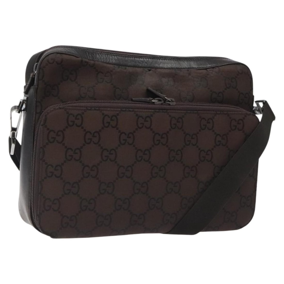 Brown GG Canvas Shoulder Bag by Gucci Model 001 3294: Brown GG Canvas Shoulder Bag by Gucci Model 001 3294 This GUCCI GG Canvas Shoulder Bag features a brown and silver color scheme with the signature GG canvas exterior. Designed for women, the bag offer
