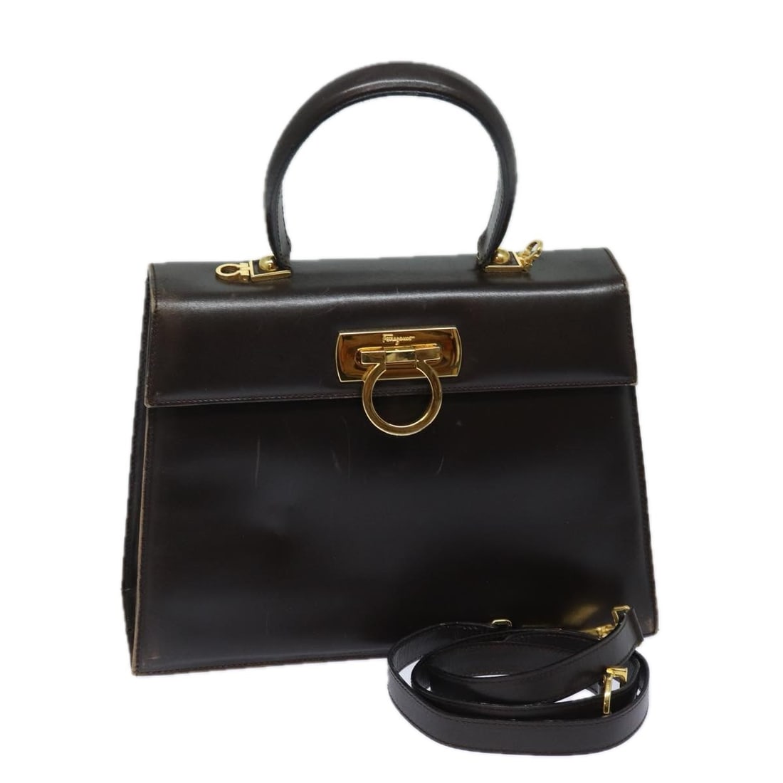 Ferragamo Gancini Brown Leather 2way Shoulder Bag: Ferragamo Gancini Brown Leather 2way Shoulder Bag This Salvatore Ferragamo Gancini handbag is crafted from brown leather and offers versatile 2-way use with both a top handle and an adjustable shoulde