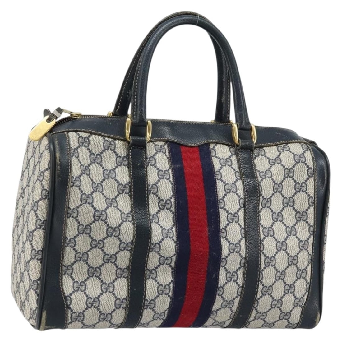 Gucci GG Supreme Sherry Line Navy PVC Leather Handbag with Gold and Red Trim: Gucci GG Supreme Sherry Line Navy PVC Leather Handbag with Gold and Red Trim This is a Gucci GG Supreme Sherry Line handbag featuring navy, gold, and red tones. Crafted from PVC leather and GG canvas,