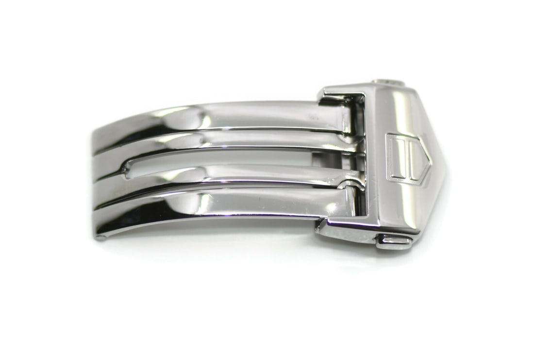 TAG Heuer 16mm Stainless Steel Deployment Buckle for FC5014: TAG Heuer 16mm Stainless Steel Deployment Buckle for FC5014 Elevate your wristwatch with this authentic TAG Heuer Stainless Steel Deployment Buckle. Designed for durability and style, this buckle is c