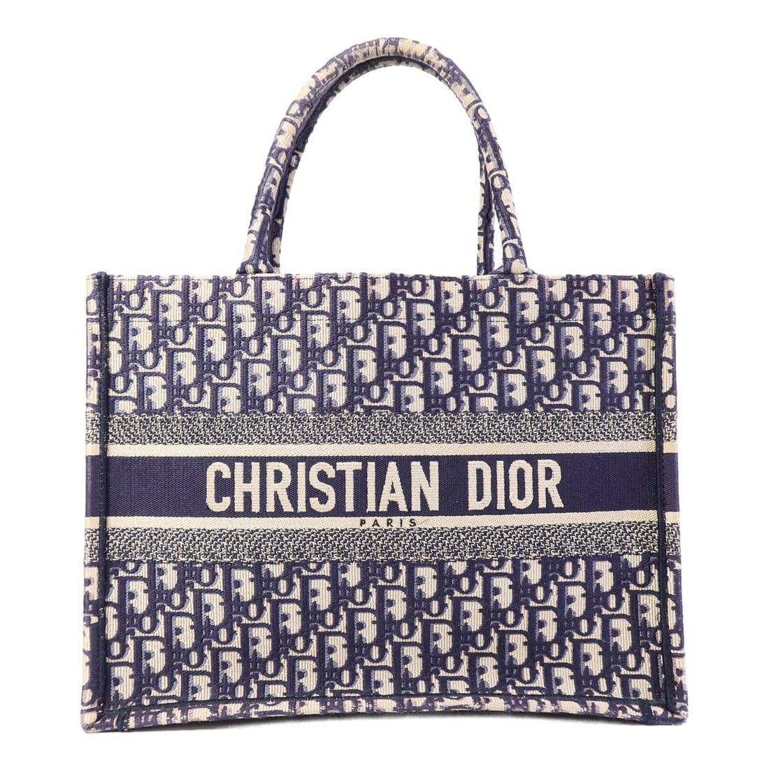 Dior Book Tote Medium Blue Canvas Handbag: Dior Book Tote Medium Blue Canvas Handbag This Christian Dior Book Tote Medium is a stylish and functional tote bag crafted from blue canvas. Designed for women, it features a spacious interior and a 