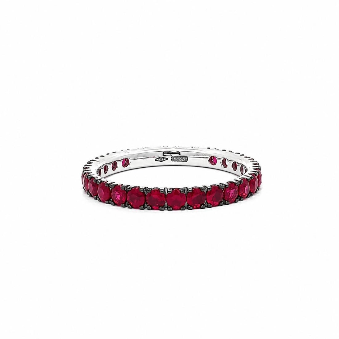 Unbranded 18k White Gold Ruby Eternity Band Ring 1.35ctw Size 5.5: Unbranded 18k White Gold Ruby Eternity Band Ring 1.35ctw Size 5.5 Low profile eternity band ring crafted in solid 18k white gold with a black rhodium top, set with numerous natural genuine vivid red r