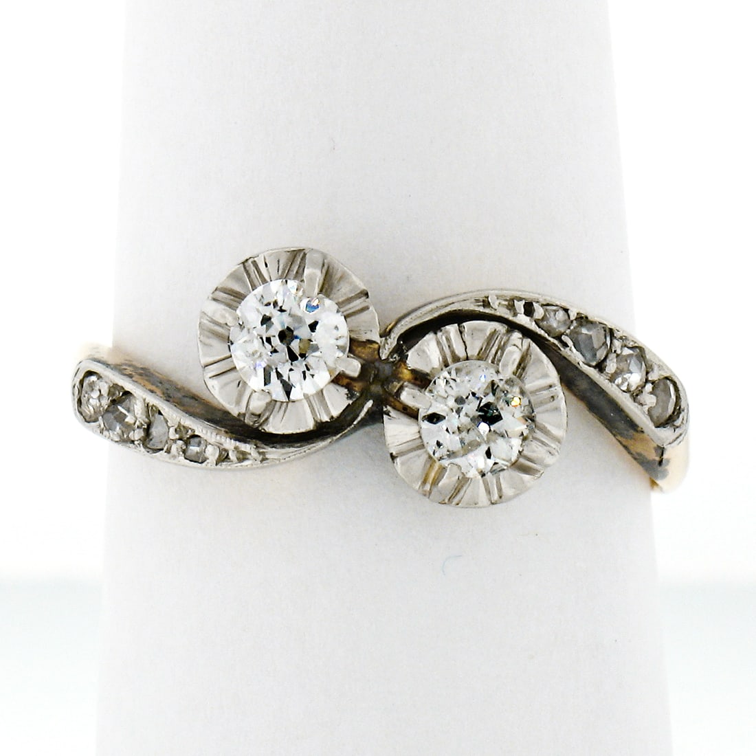 Antique Edwardian 14K Gold Platinum Bypass Ring with .54ct Diamonds: Antique Edwardian 14K Gold Platinum Bypass Ring with .54ct Diamonds This exquisite Antique Edwardian ring features a stunning bypass design crafted from solid 14K yellow gold with a durable platinum t