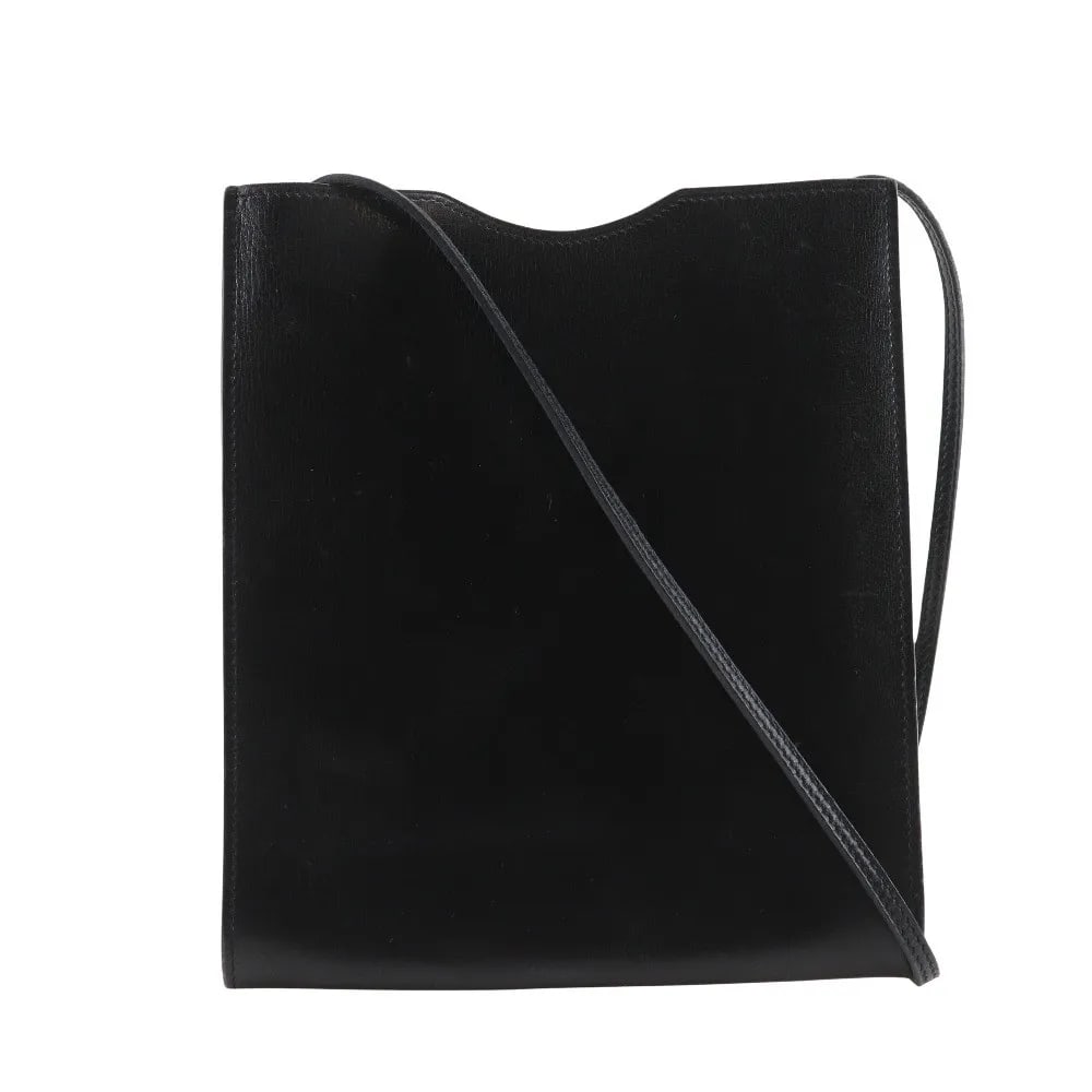 Hermes Onimaitou black leather handbag 16cm x 19cm x 1.5cm: Hermes Onimaitou black leather handbag 16cm x 19cm x 1.5cm The Hermes Onimaitou handbag for women is crafted from black leather and features a compact design measuring 16cm x 19cm x 1.5cm. Made in Fra