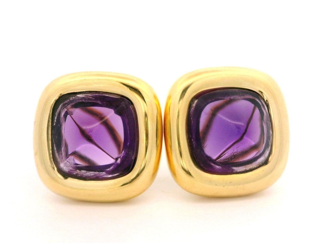 Italian 18k Yellow Gold Amethyst Sugarloaf Stud Earrings: Italian 18k Yellow Gold Amethyst Sugarloaf Stud Earrings Elevate your jewelry collection with these exquisite Italian 18k Yellow Gold High Quality Sugarloaf Cabochon Amethyst Button Earrings. Featurin