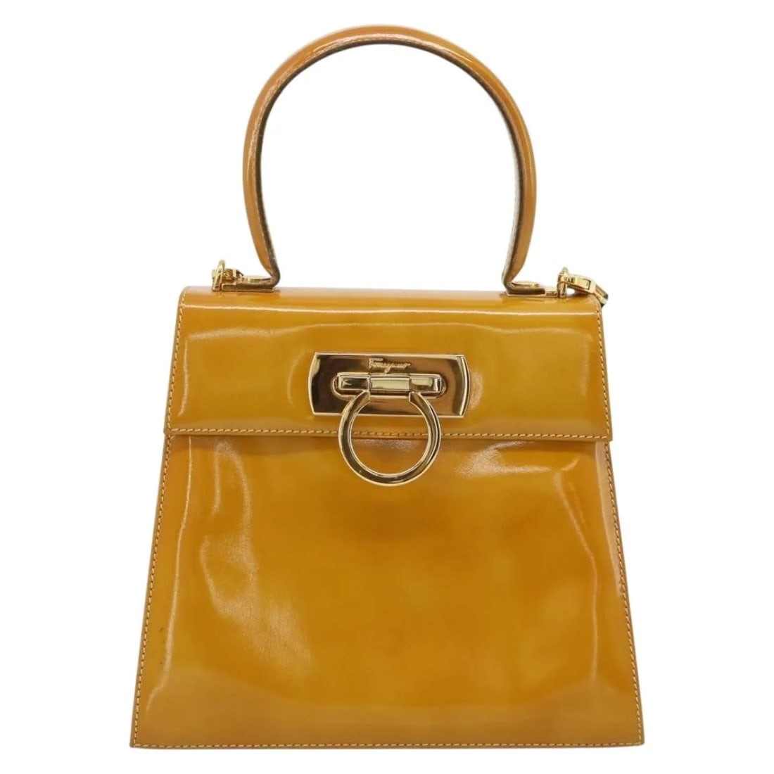 Salvatore Ferragamo yellow patent leather Gancini handbag: Salvatore Ferragamo yellow patent leather Gancini handbag This Salvatore Ferragamo Gancini handbag is crafted from yellow patent leather and features the iconic Gancini design. Made in Italy, it is de
