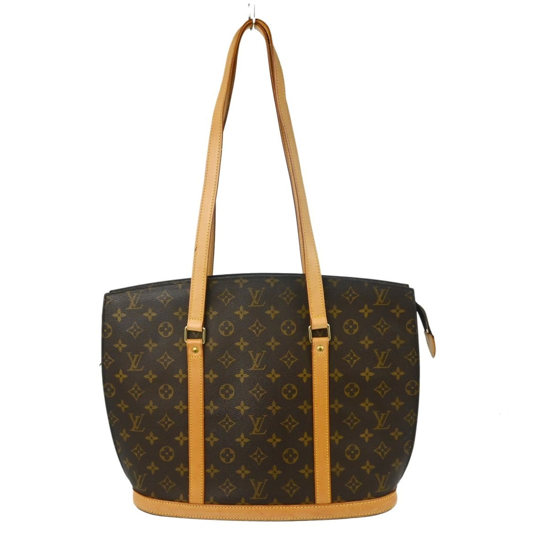 Louis Vuitton Babylone Monogram Canvas Tote Bag M51102: Louis Vuitton Babylone Monogram Canvas Tote Bag M51102 Vintage Louis Vuitton Babylone tote bag in brown Monogram canvas with leather trim and double handles. This zip-top handbag features a brown lini