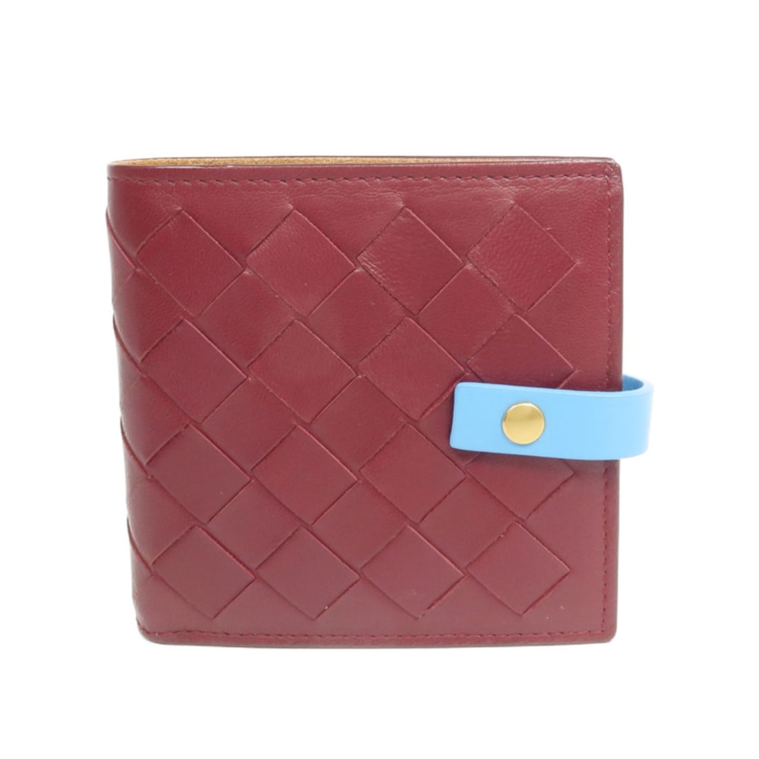 Bottega Veneta Intrecciato Leather Bi-fold Wallet Bordeaux Blue GHW: Bottega Veneta Intrecciato Leather Bi-fold Wallet Bordeaux Blue GHW This Bottega Veneta bi-fold wallet is crafted from signature Intrecciato leather in a sophisticated Bordeaux hue. Designed for women