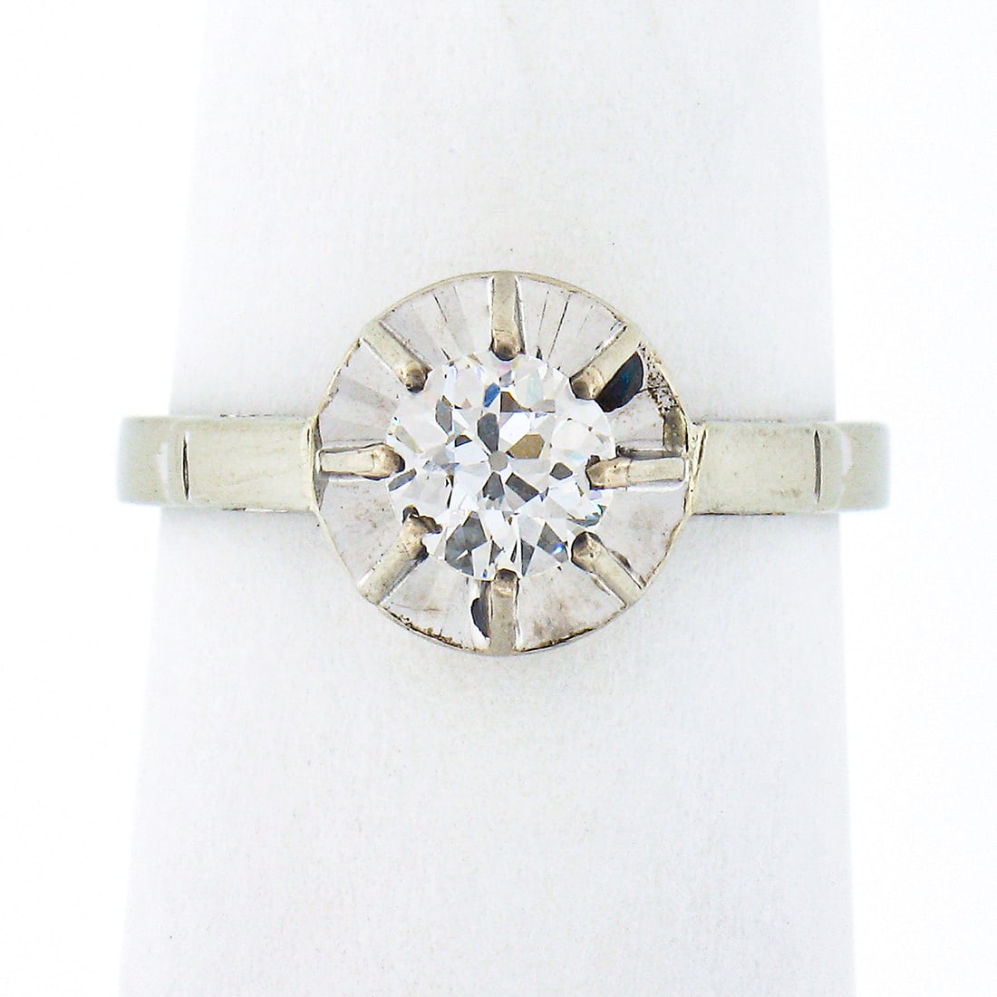 Antique French 18K White Gold 0.54ct Diamond Solitaire Engagement Ring: Antique French 18K White Gold 0.54ct Diamond Solitaire Engagement Ring This exquisite Antique French engagement ring showcases a stunning 0.54 ct old European cut diamond, elegantly illusion prong set