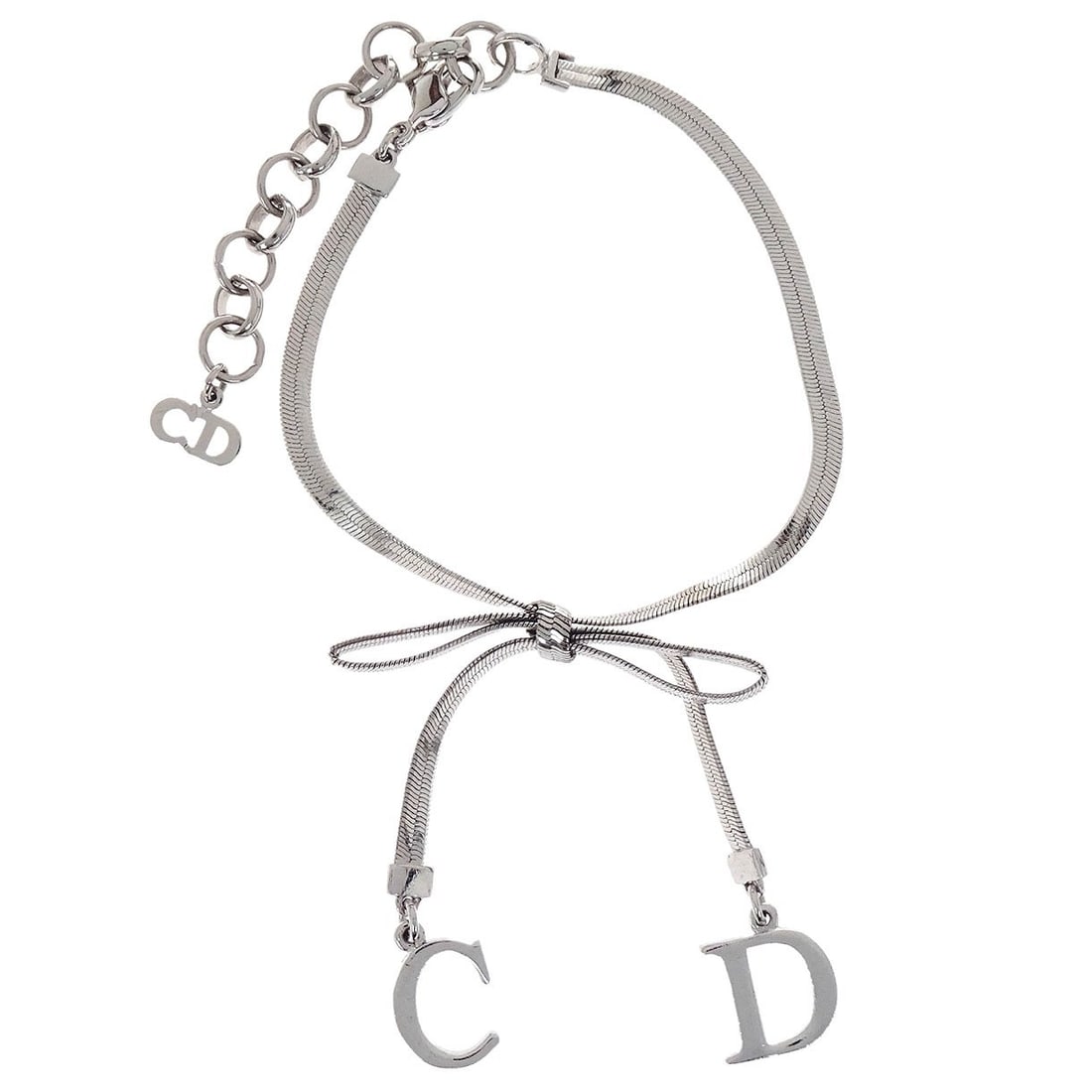 Dior Silver Plated Bracelet: Dior Silver Plated Bracelet Christian Dior silver-tone bracelet in silver-plated metal. This piece is in very good condition with minor scuffs and does not include accessories. Specifications Brand: C
