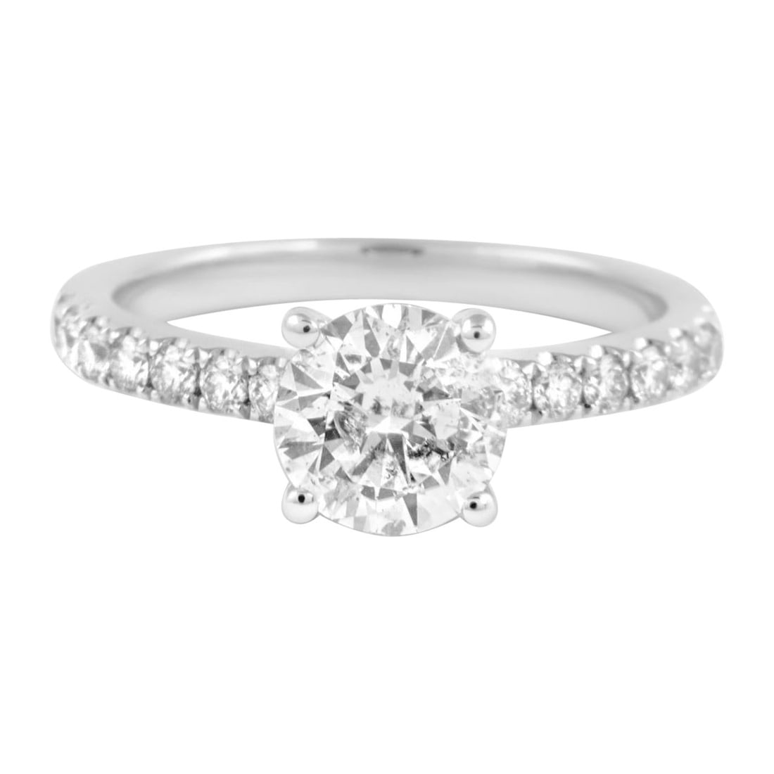 1.13 Carat Round Diamond Ring in 18K White Gold with 28 Accents: 1.13 Carat Round Diamond Ring in 18K White Gold with 28 Accents This stunning 1.13 Carat Round Brilliant Diamond Ring is crafted in luxurious 18 Karat White Gold. Featuring a captivating classic solit