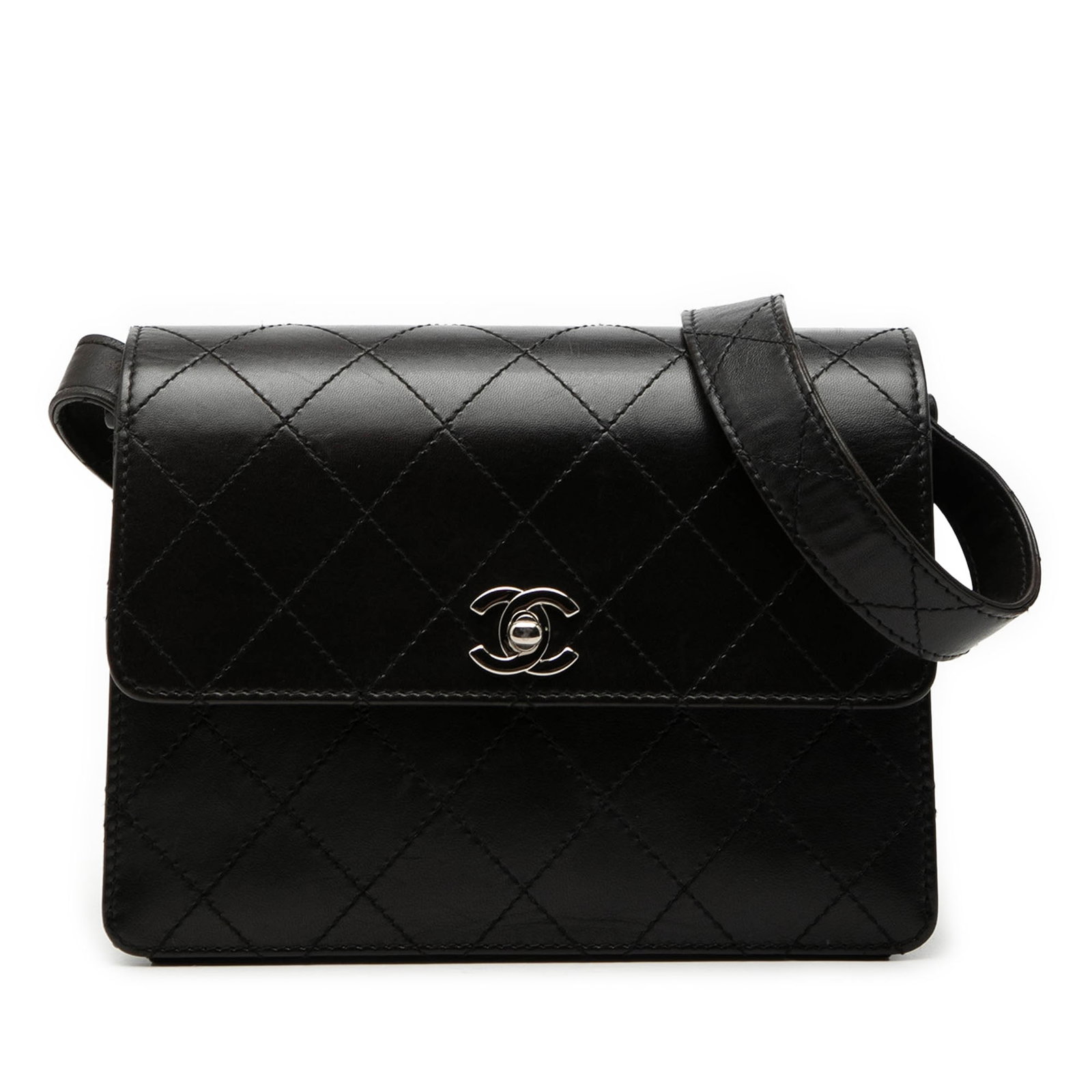 Chanel quilted lambskin flap bag with turn lock: Chanel quilted lambskin flap bag with turn lock This Chanel CC Quilted Lambskin Flap Shoulder Bag features a luxurious quilted lambskin leather exterior in black, complemented by a flat leather should